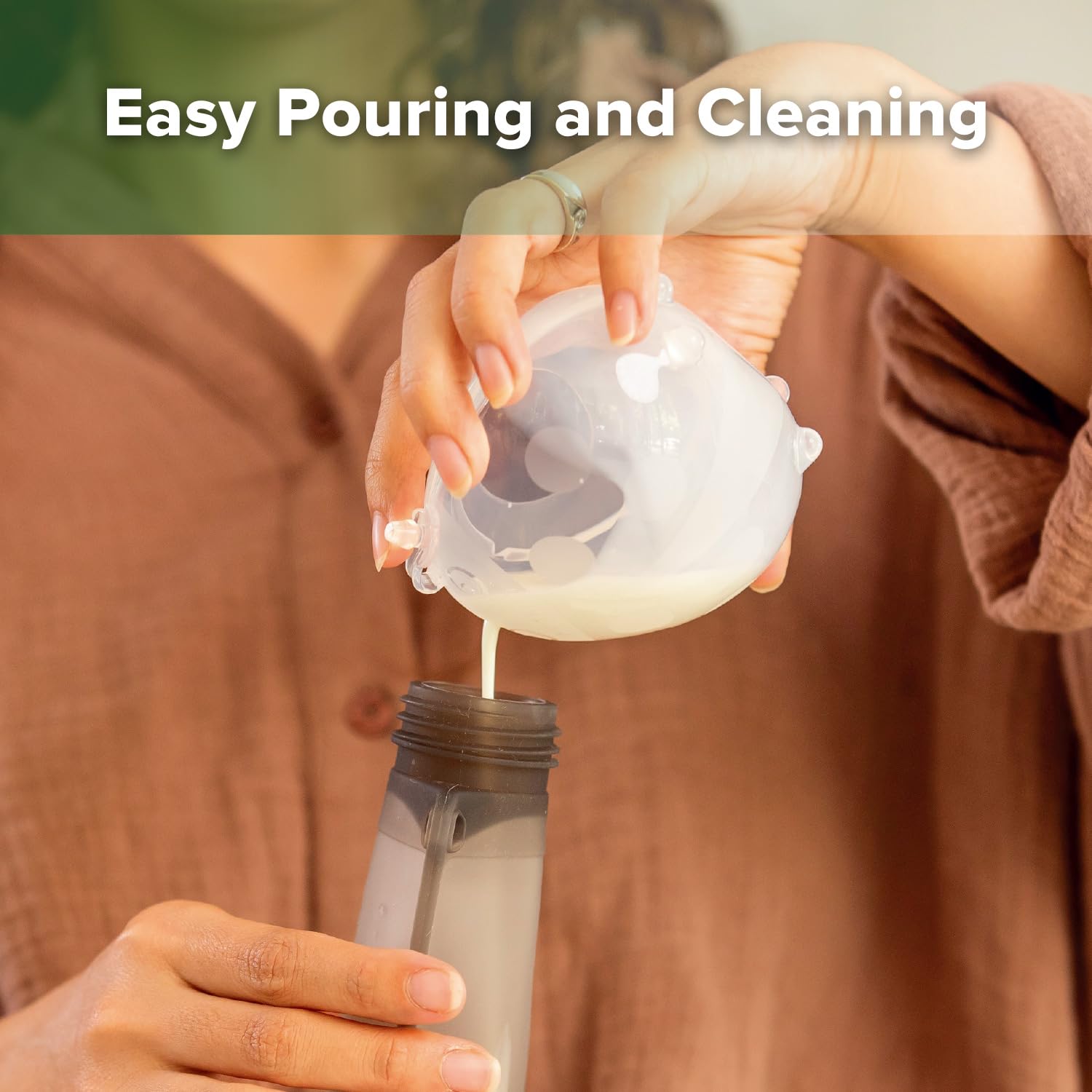 Haakaa Ladybug milk collector demonstrating leak-proof design