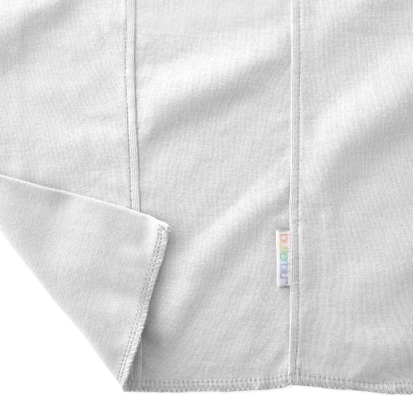 Close-up shot of the hypoallergenic organic cotton fabric gentle on newborn skin.
