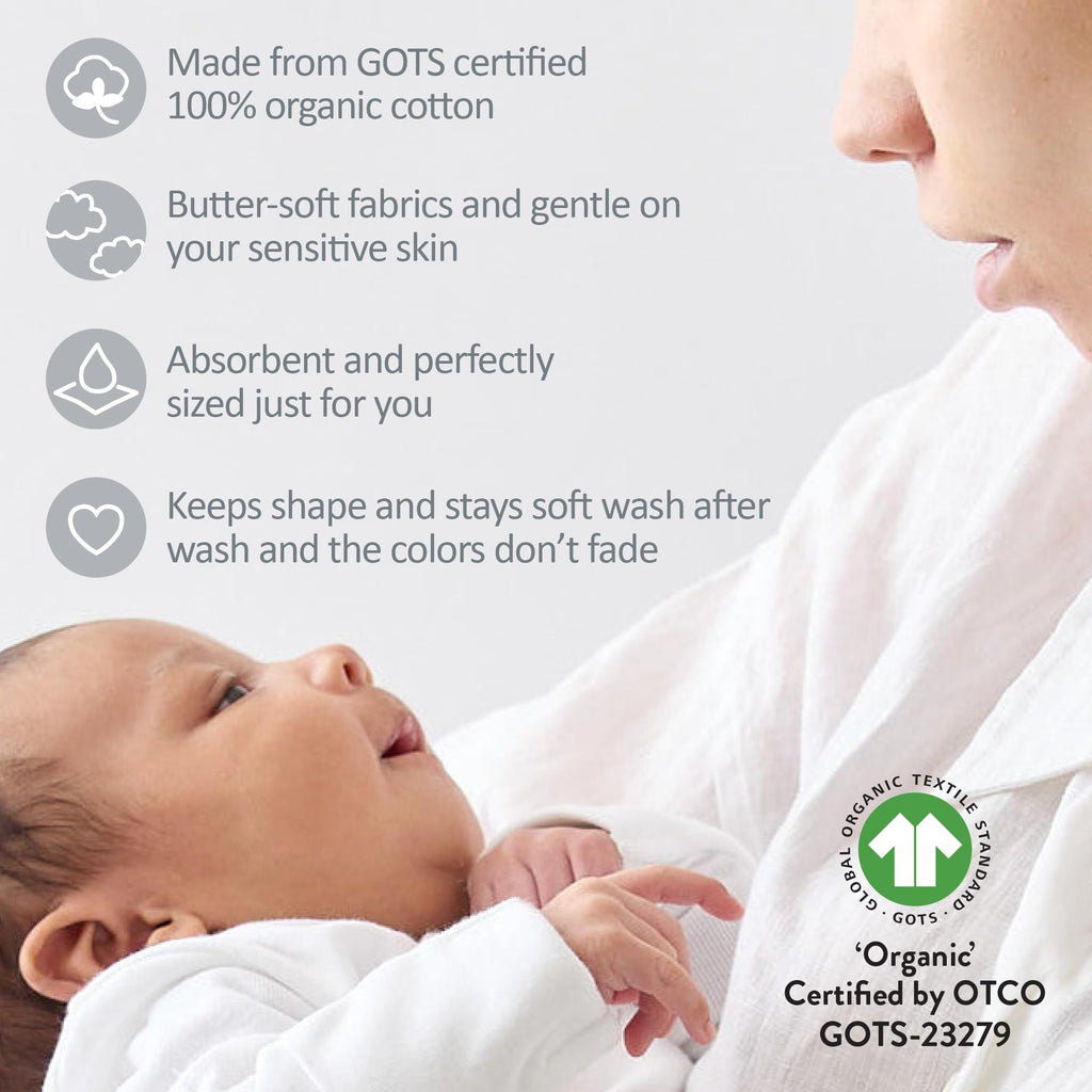 Gender-neutral white organic baby cloths packaged as a set for newborns.
