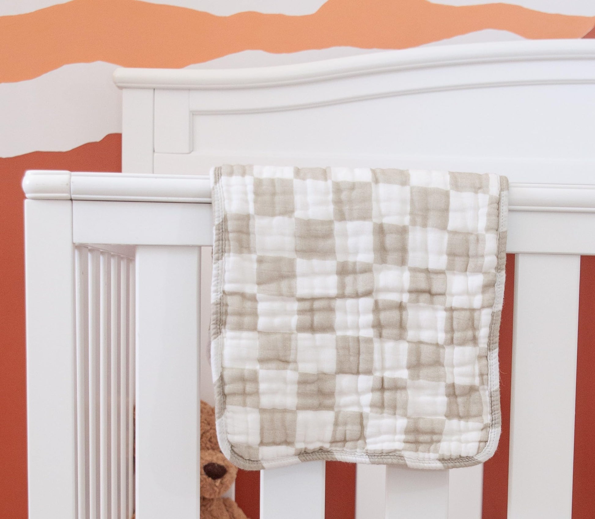 Nana Baby Organics burp cloths stacked for nursery