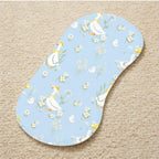 Four pieces of Wauprant whimsical goose aesthetic baby cloths folded neatly inside a modern diaper bag.