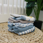 Parent using large 22x11 inch burp cloth on shoulder