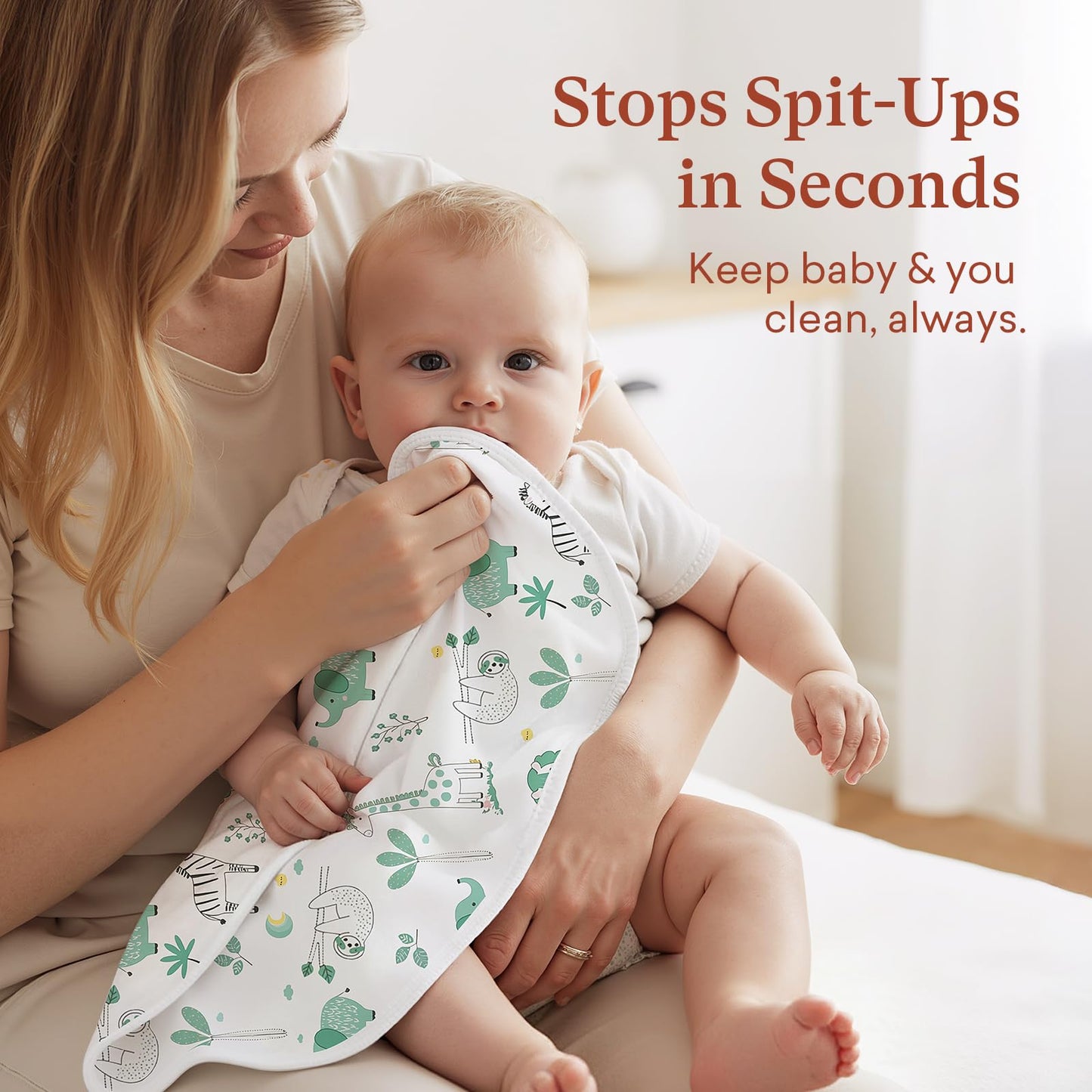 Littogoose newborn feeding cloths being used as a mini towel for quick spill cleanups.