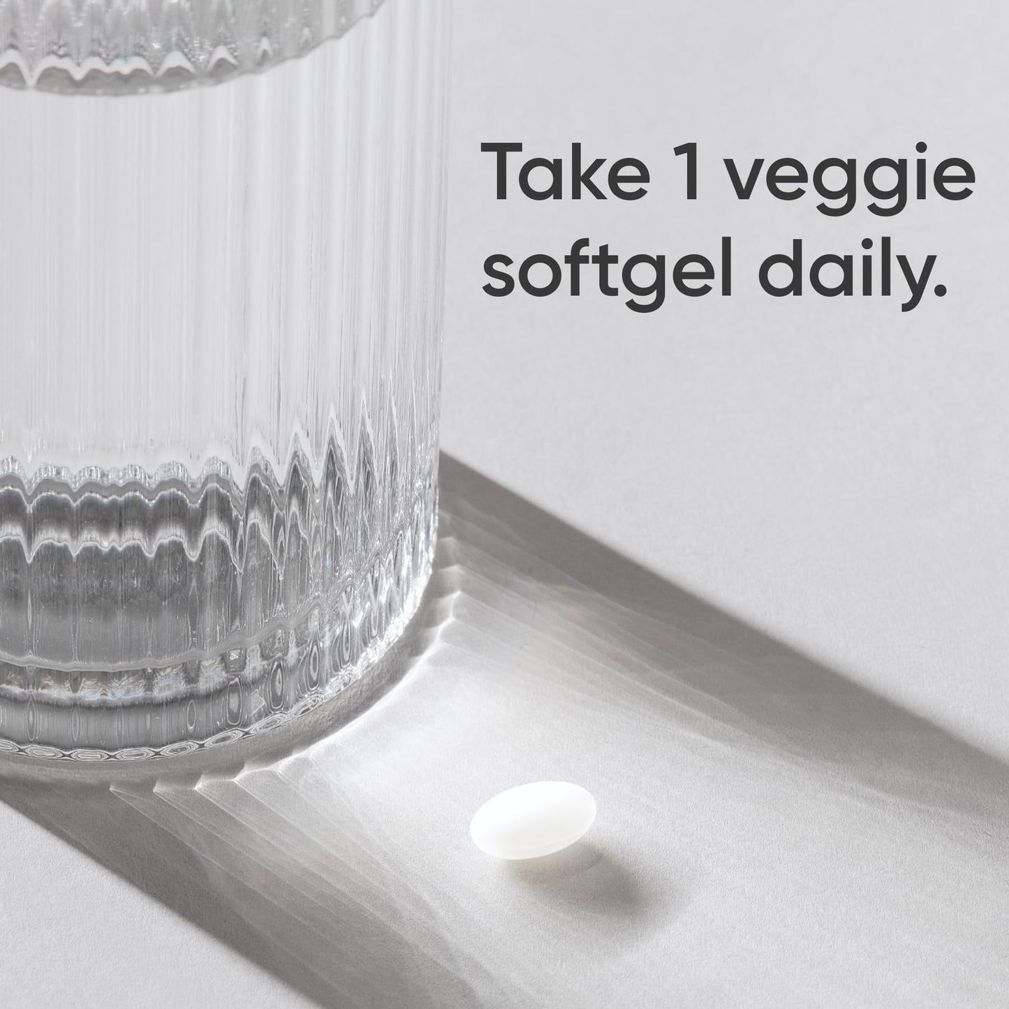 Vegan certified biotin 120 veggie softgels container highlighting non-GMO and gluten-free seals