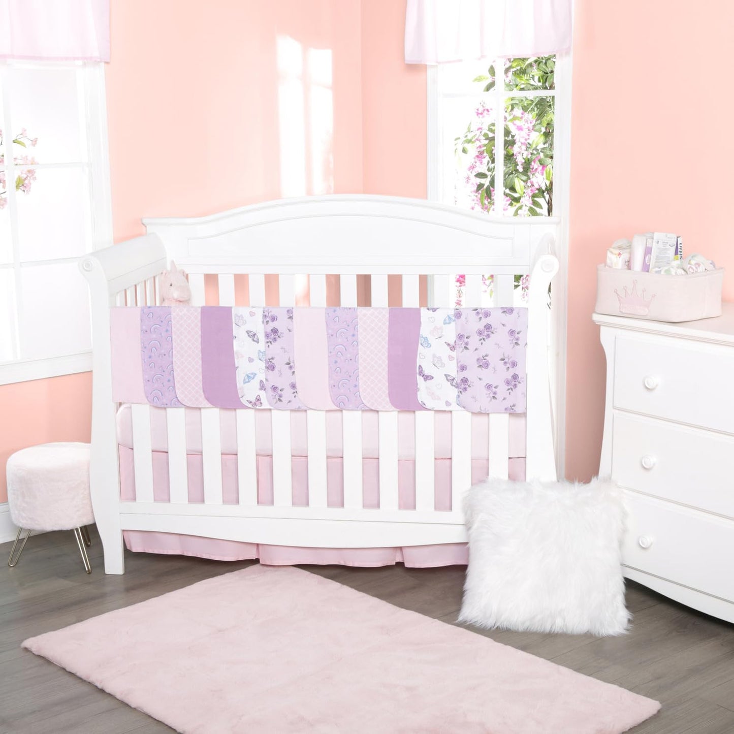 Everyday Kids infant burping rags folded neatly displaying solid pink and rainbow patterns