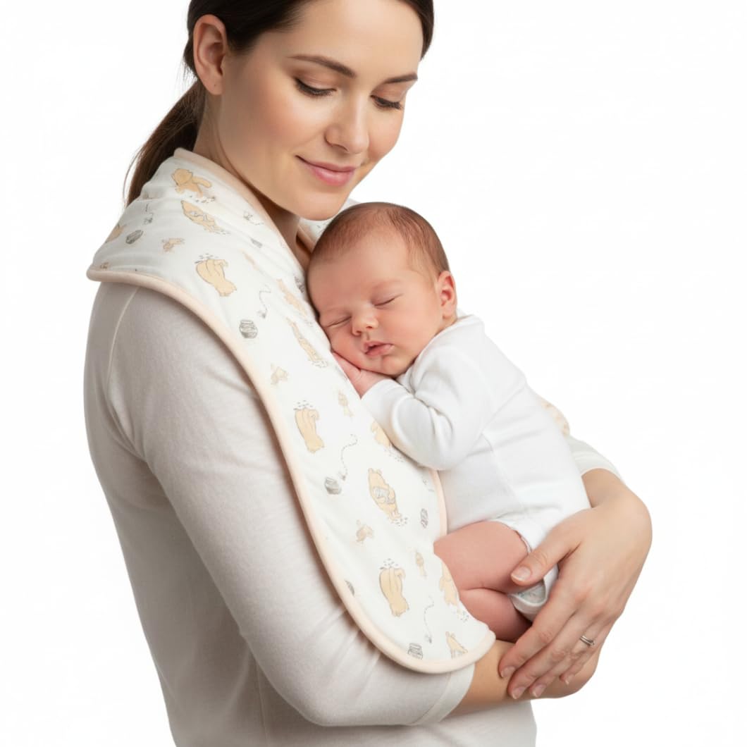 Disney baby feeding essentials showing the twenty by ten inch dimensions and absorbent stitch detail.