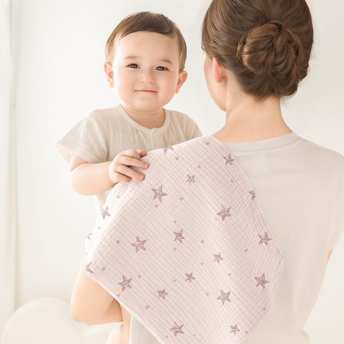 Susurration 100 percent cotton baby washcloths folded neatly showing fabric texture.