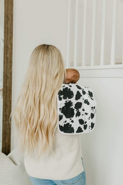 Large 21 by 10 inch burp cloth on parent shoulder