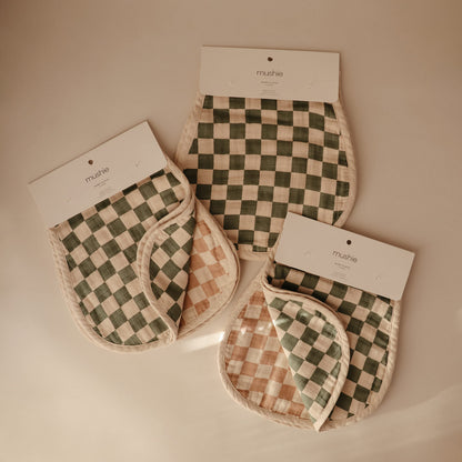Two organic cotton muslin baby burp cloths set flat