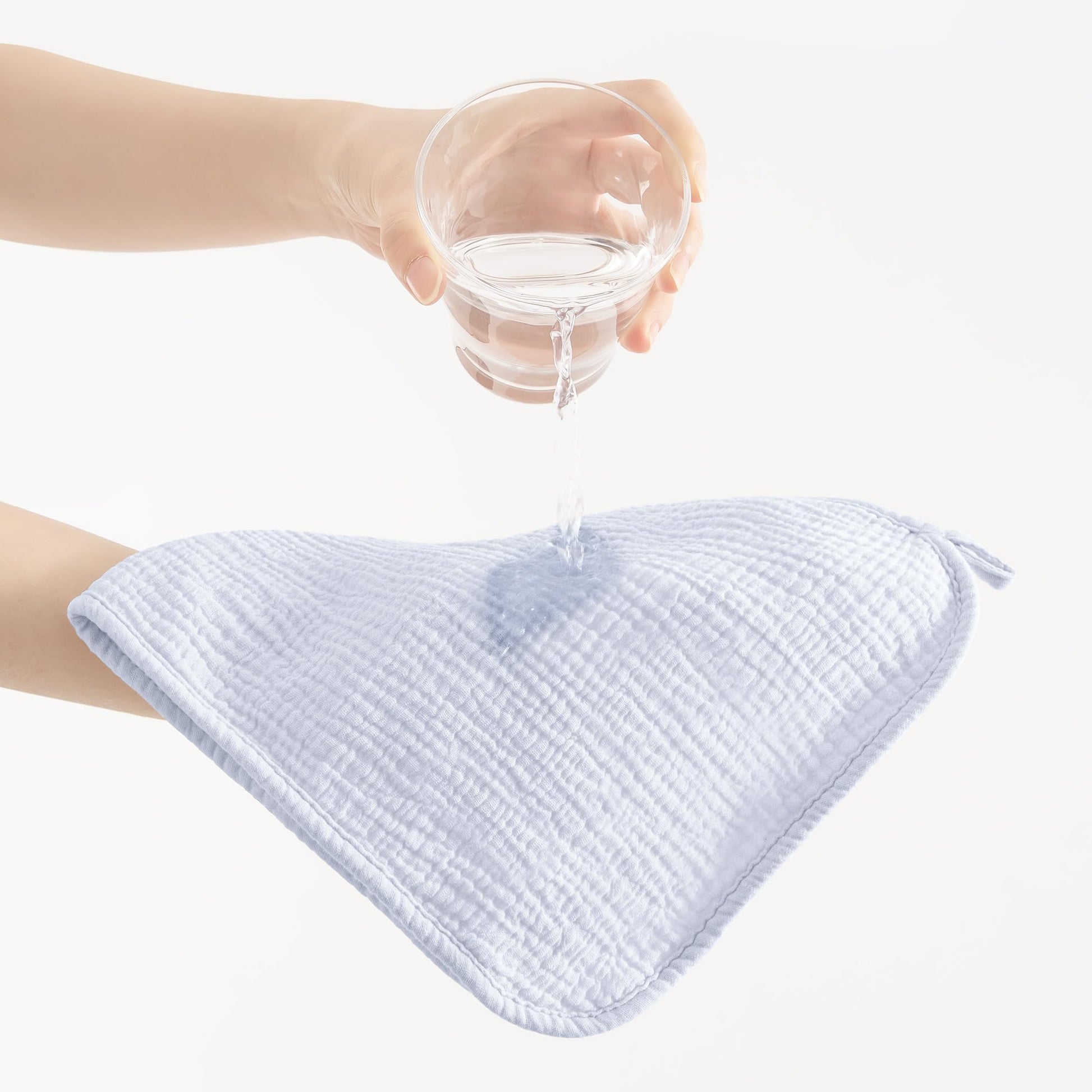 Susurration twenty by ten inch baby cloth draped over a shoulder for spit up protection.