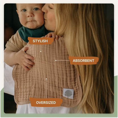 Parent using large Parker Baby burp cloth on shoulder