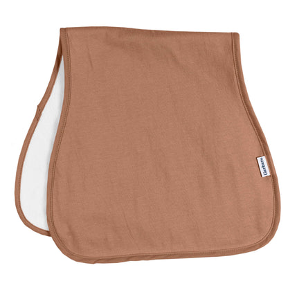 Parent using Gerber rust and tan burp cloth on shoulder
