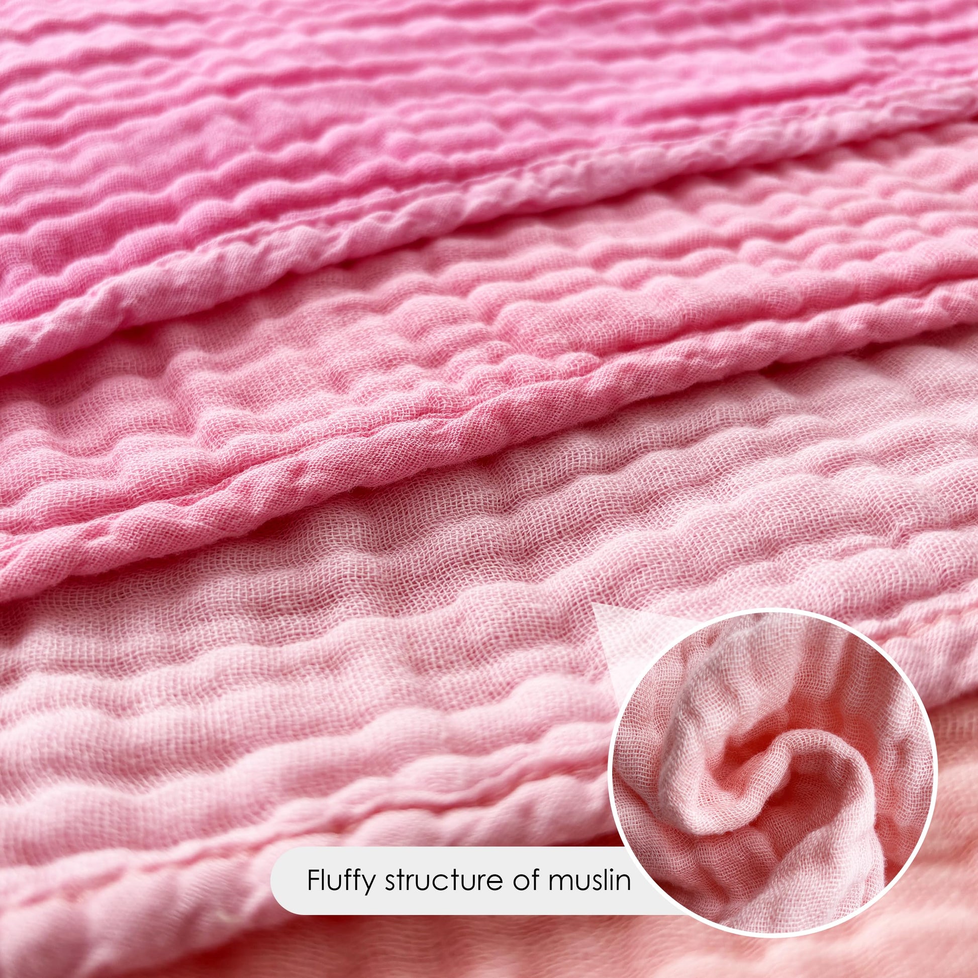 Absorbent multi layer cotton muslin cloth wiping baby drool gently from a newborn girl's face.