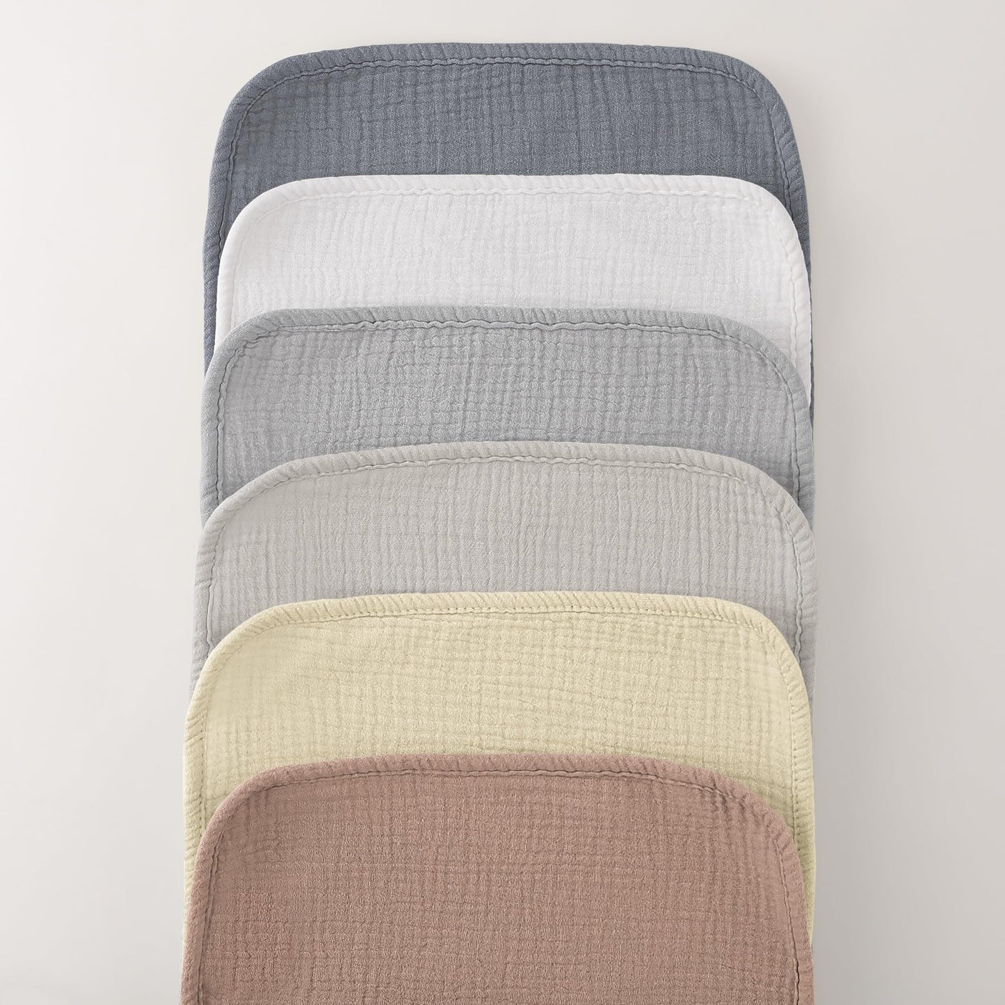 Bearmoss absorbent burp cloths displayed on shoulder