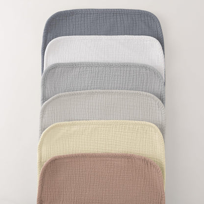 Bearmoss absorbent burp cloths displayed on shoulder