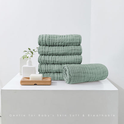 Close up view of the absorbent multi layer cotton weave on the baby burping towel.