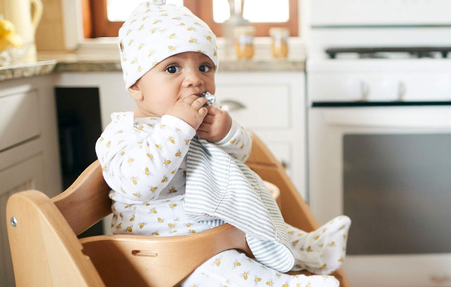 Burt's Bees Baby newborn burp cloths over shoulder usage