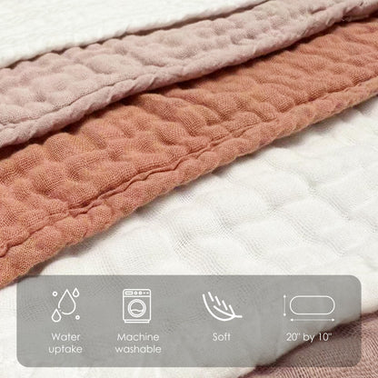 Absorbent muslin rags absorbing liquid spill effectively on changing table
