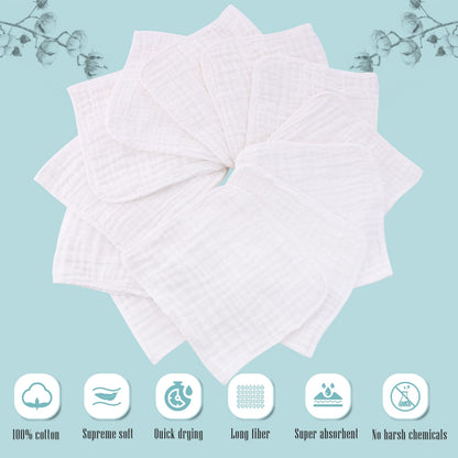 Stacked white cotton muslin burp cloths for baby