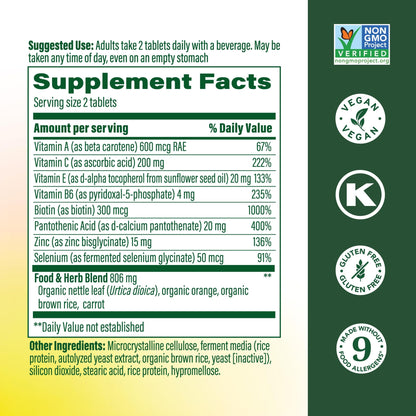 MegaFood beauty supplement bottle showing the vegan and non-GMO certification seals clearly.