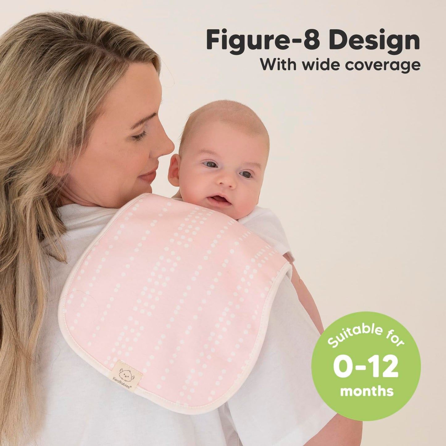 Parent using KeaBabies burp cloth on shoulder