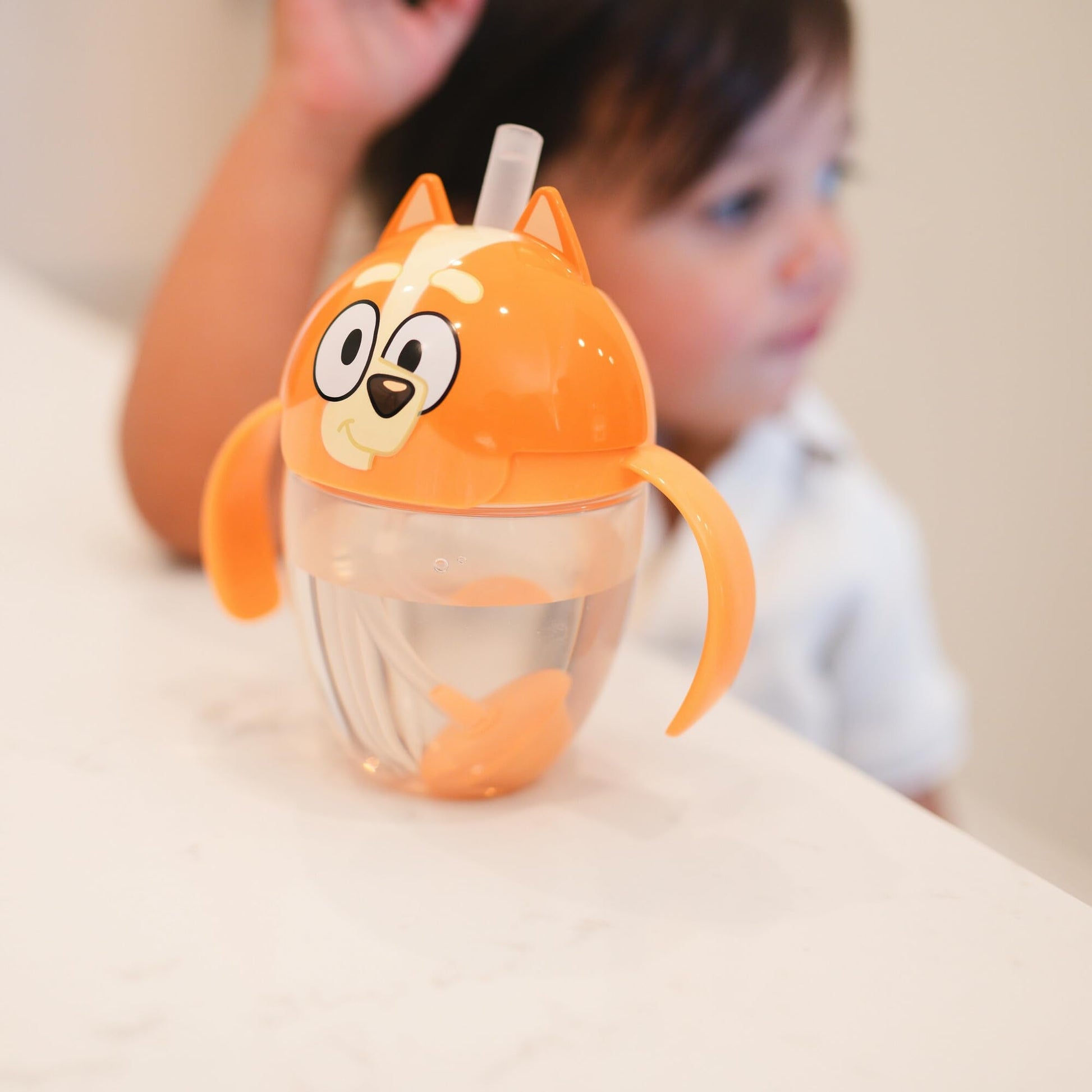 Back view of the 7 Ounce Bingo trainer cup for toddlers
