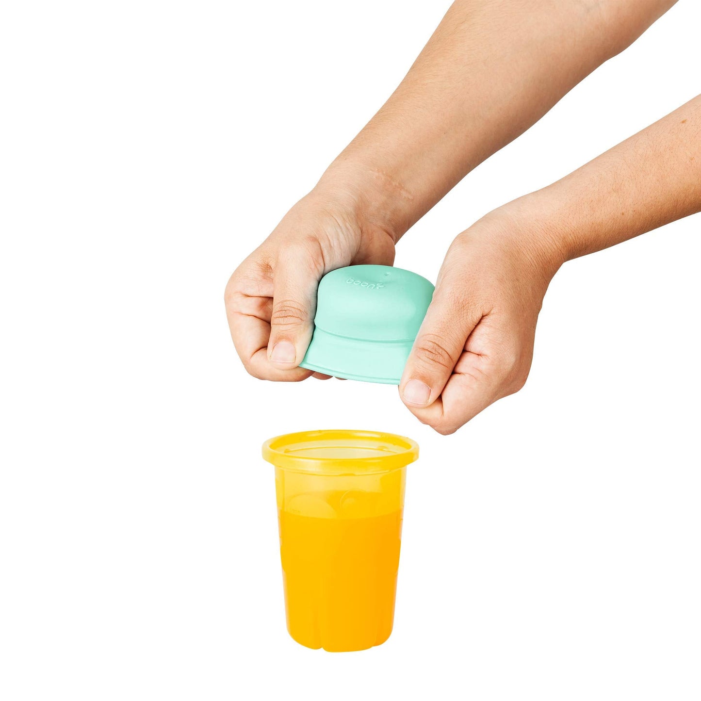 Three green and teal shaded Boon Snug silicone stretch lids displayed flat next to three matching reusable toddler straws