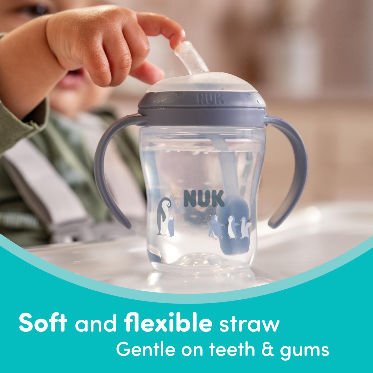 Side view of NUK learner cup with easy-grip handles