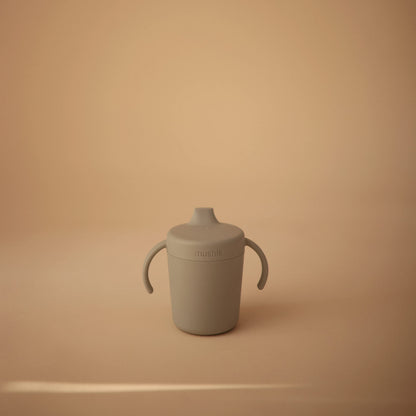 Danish designed infant training sipper in pastel sage green color