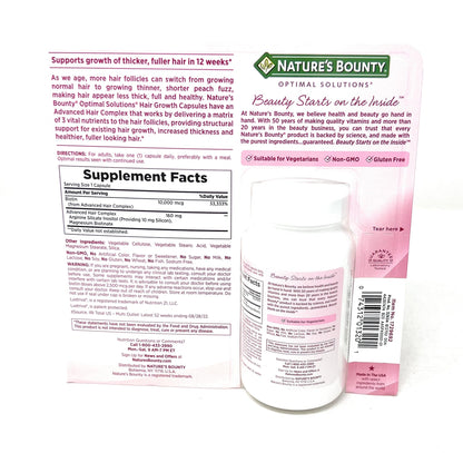 Nature's Bounty Hair Growth one per day vegetable capsules displayed on flat surface