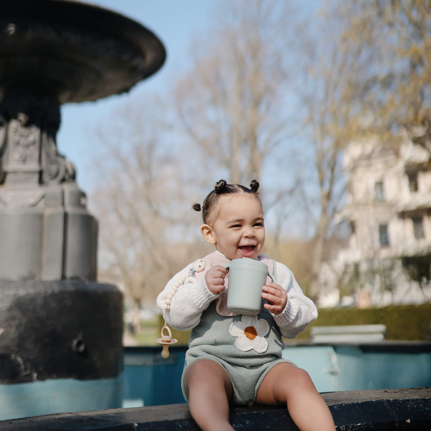 Ergonomic training sipper cup handles designed for small baby hands