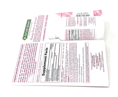 Nature's Bounty biotin silicon and arginine advanced hair complex container display
