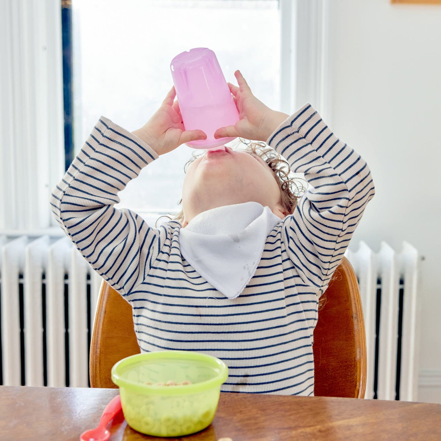 Side angle view of the leak-resistant travel friendly toddler training cups for parties.