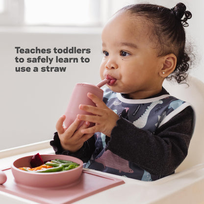 Four ounce ezpz silicone training cup in sage green colorway for young children