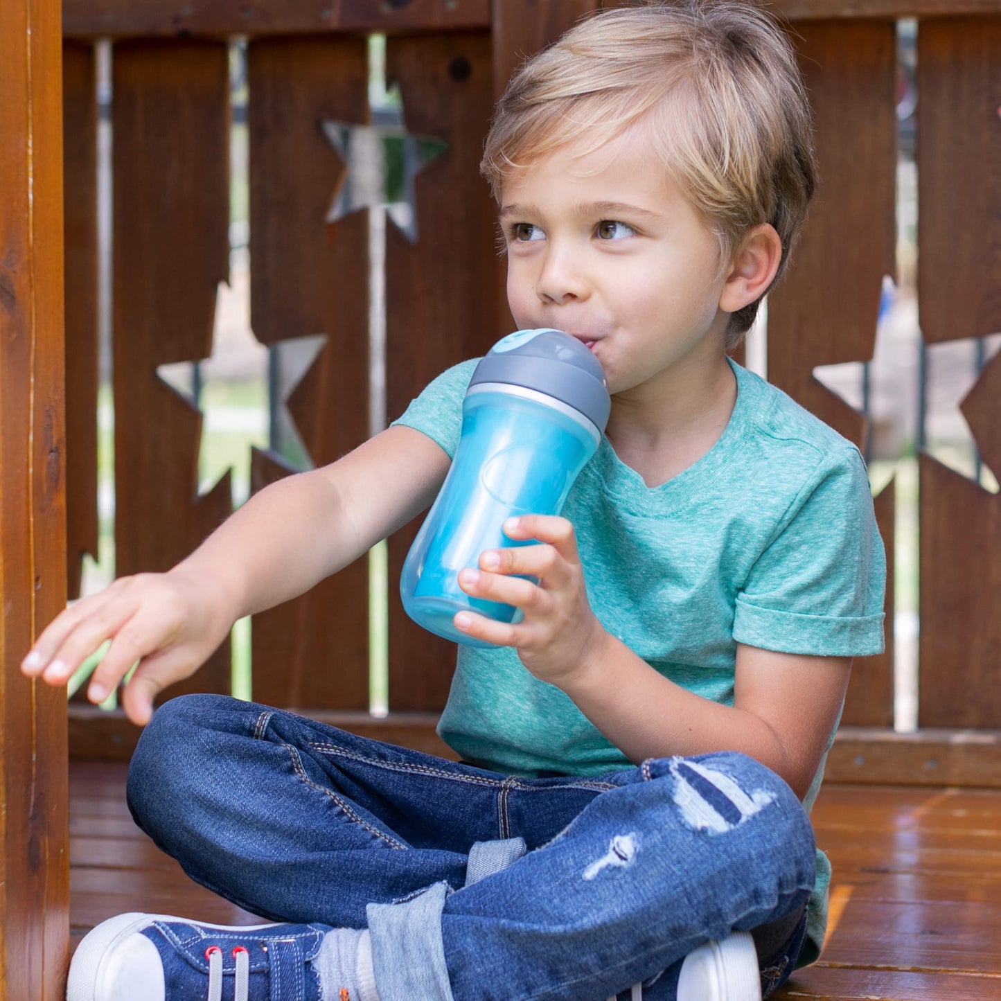 Chicco toddler sippy cup with integrated slide cover open showing the soft silicone straw