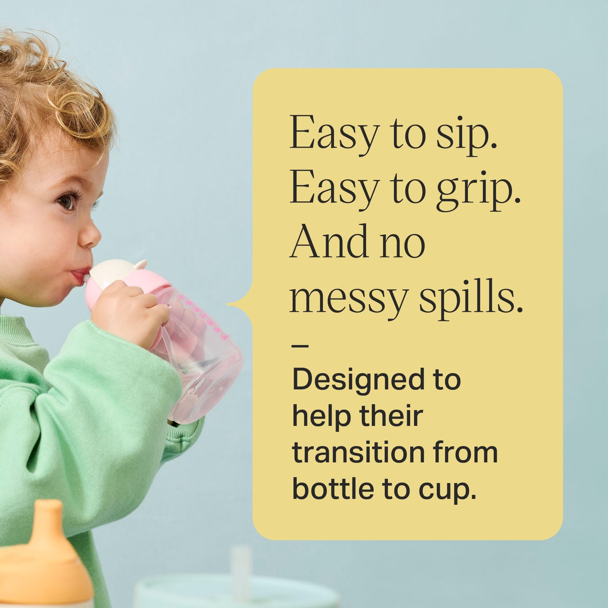 Side view of Tommee Tippee sippy cup showing weighted silicone straw