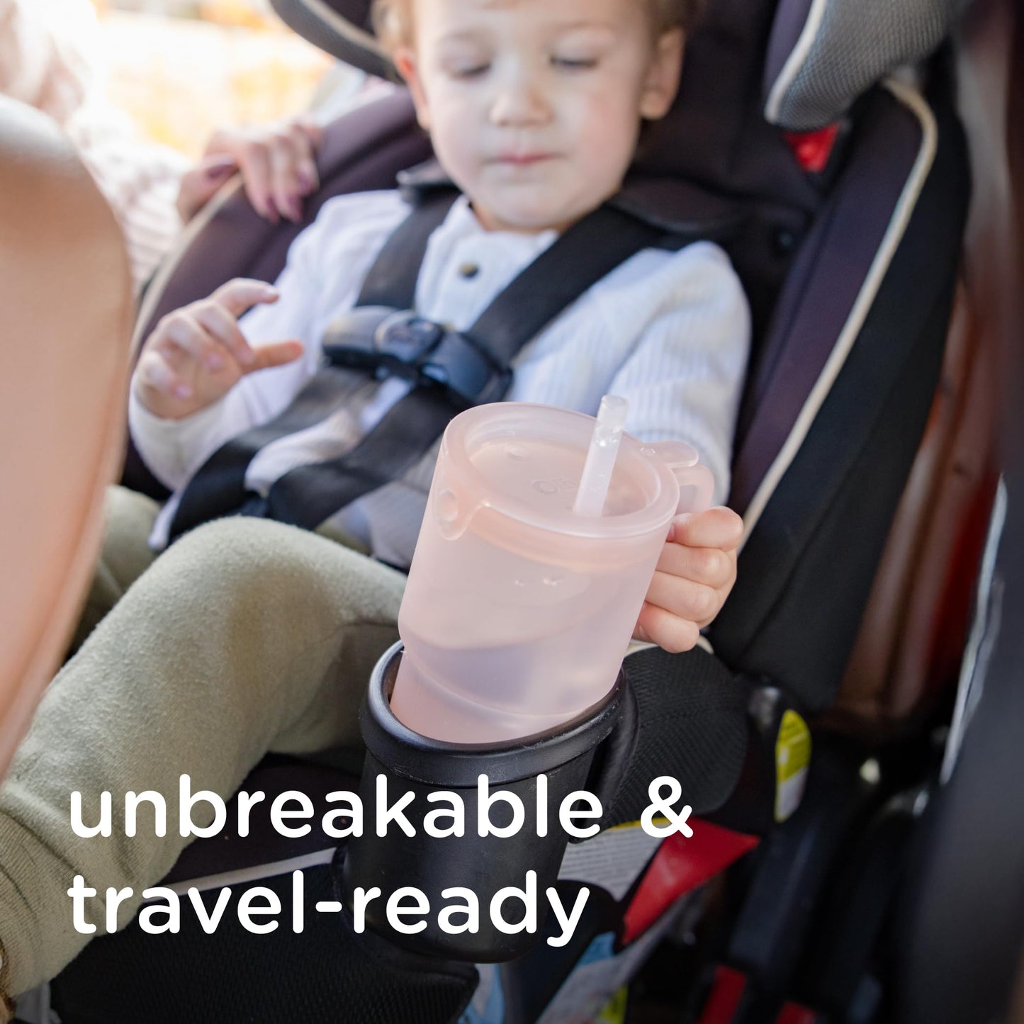 Olababy 11 fluid ounce tumbler in childs hand