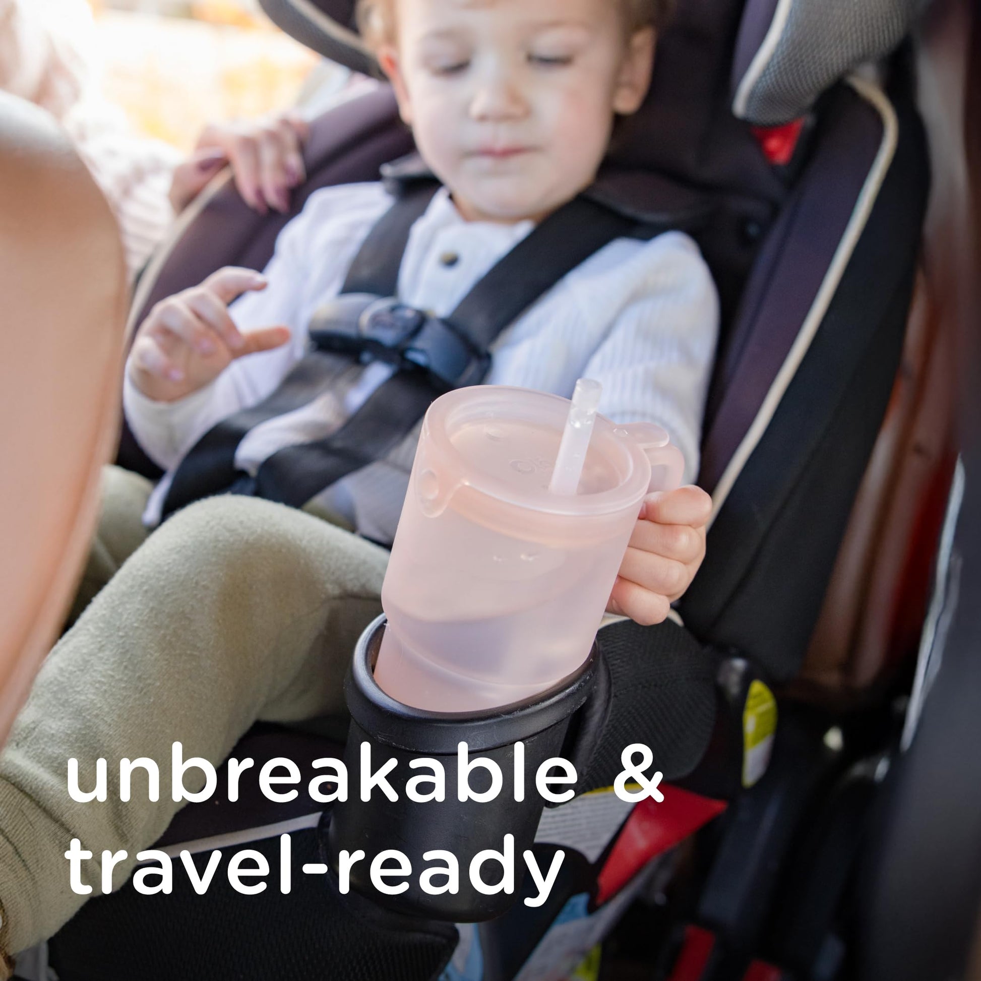 Olababy 11 fluid ounce tumbler in childs hand