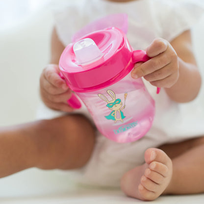 Dr. Brown's transition sipper cup with folding protective lid open for drinking.