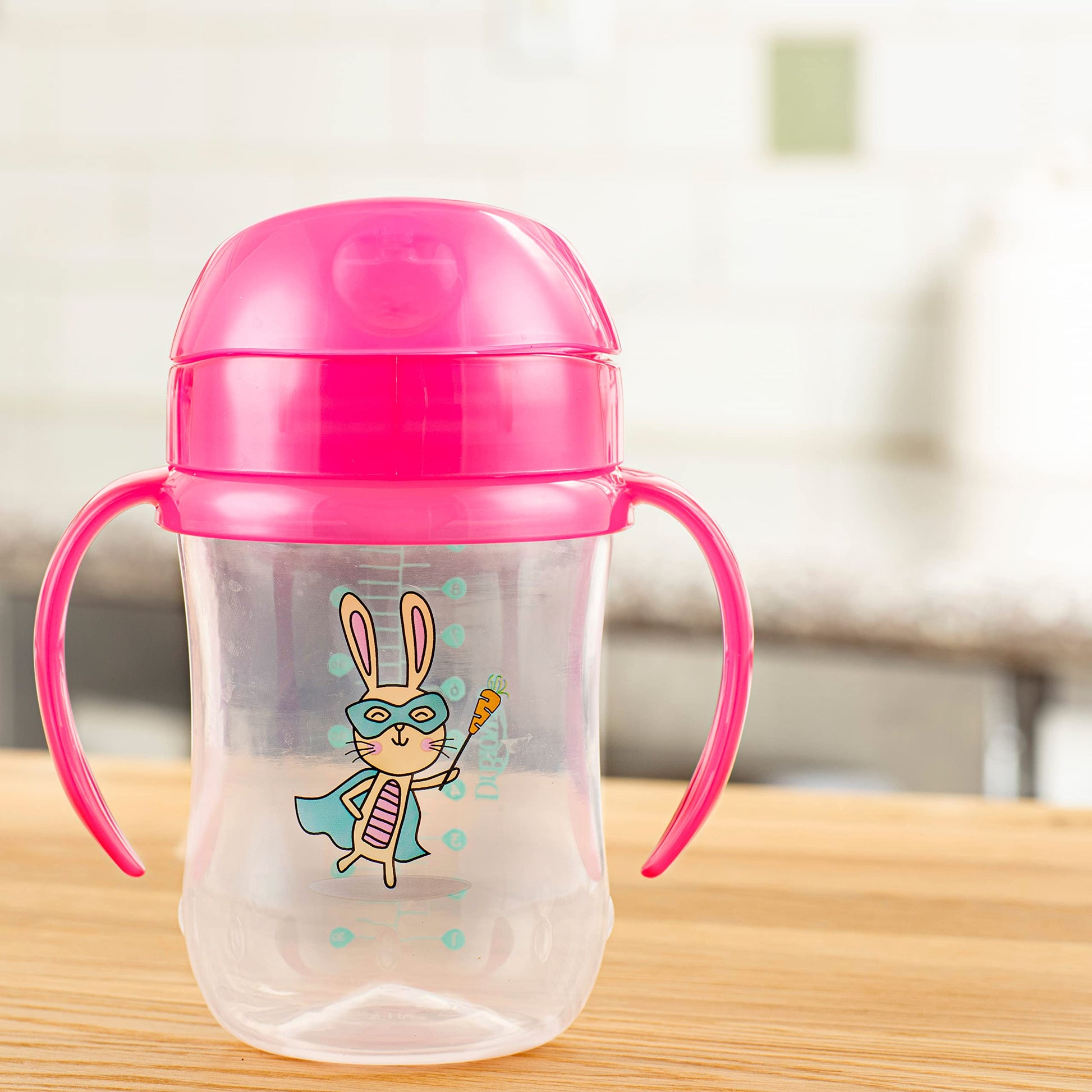 Dr. Brown's blue star sippy cup disassembled to show the easy clean one piece valve.