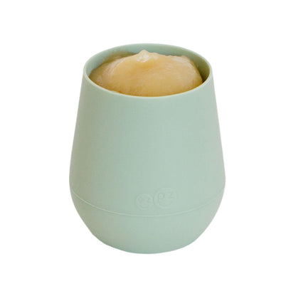 Ezpz 59 milliliters silicone cup for babies four months and older.