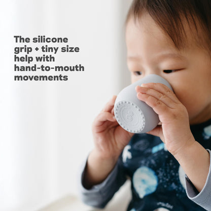 Ezpz pediatric specialist designed silicone open cup for speech development.
