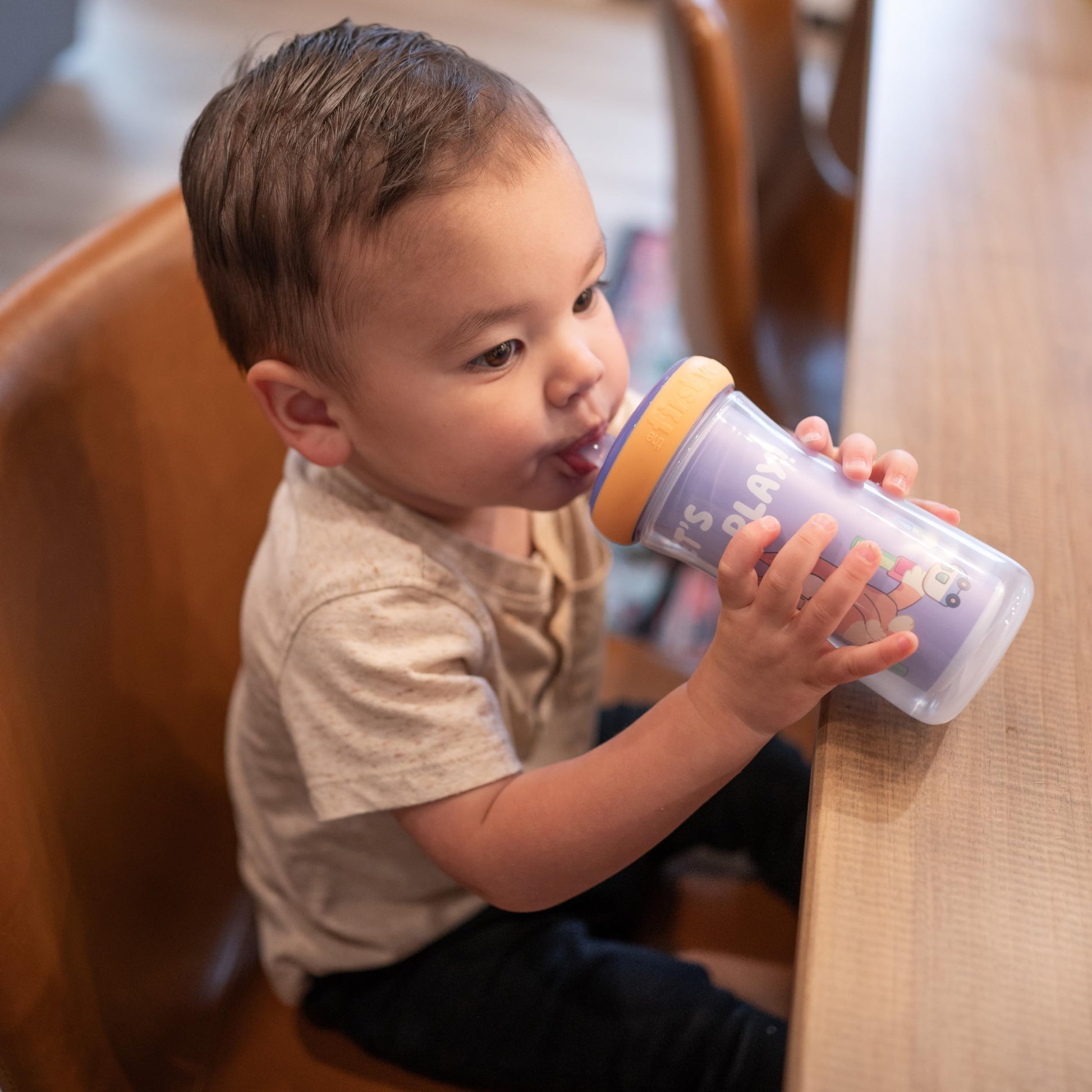 Close up of bite-resistant silicone straw on Bluey cup
