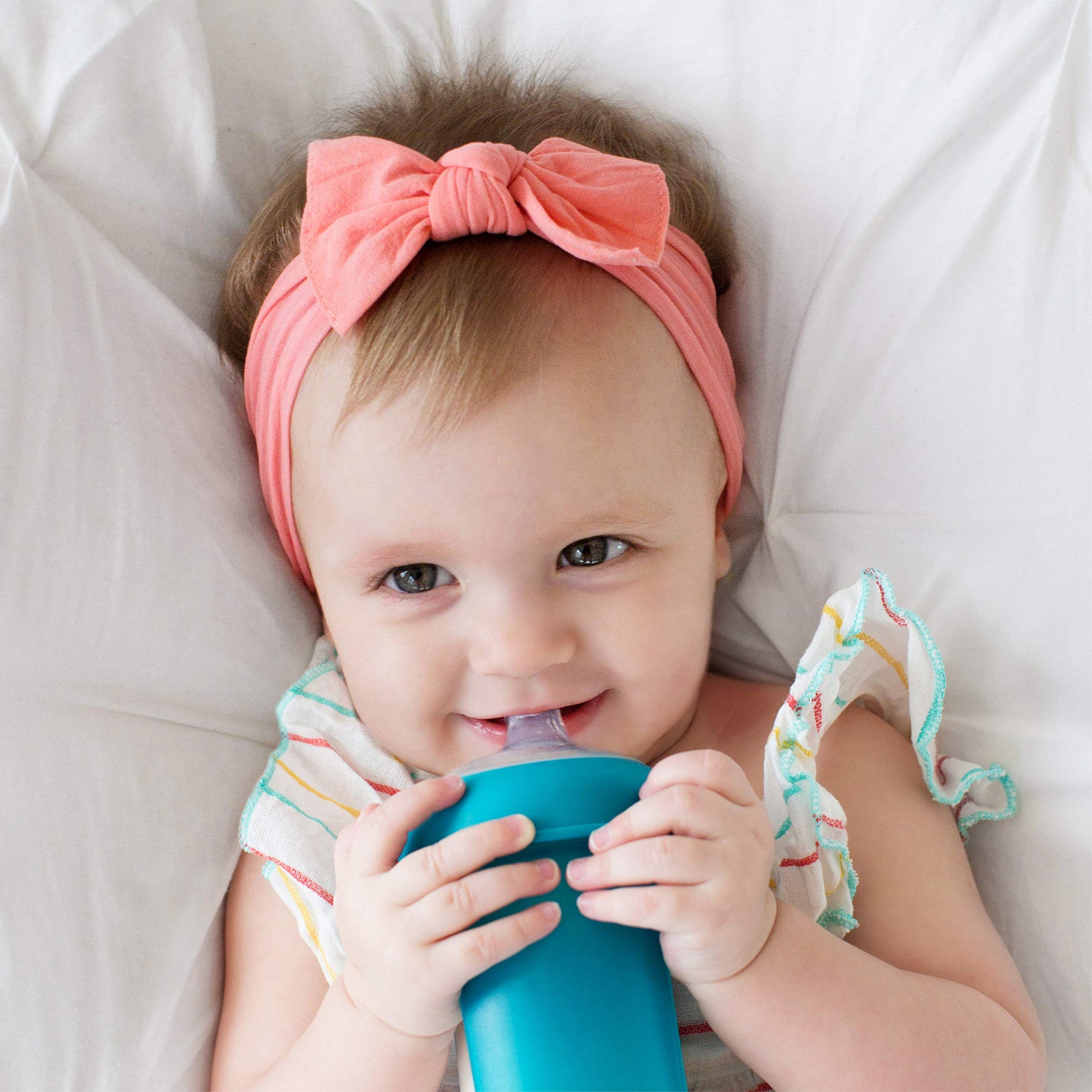 Boon baby feeding supplies packaging displaying three premium imported transitional cup tops