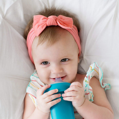 Boon baby feeding supplies packaging displaying three premium imported transitional cup tops