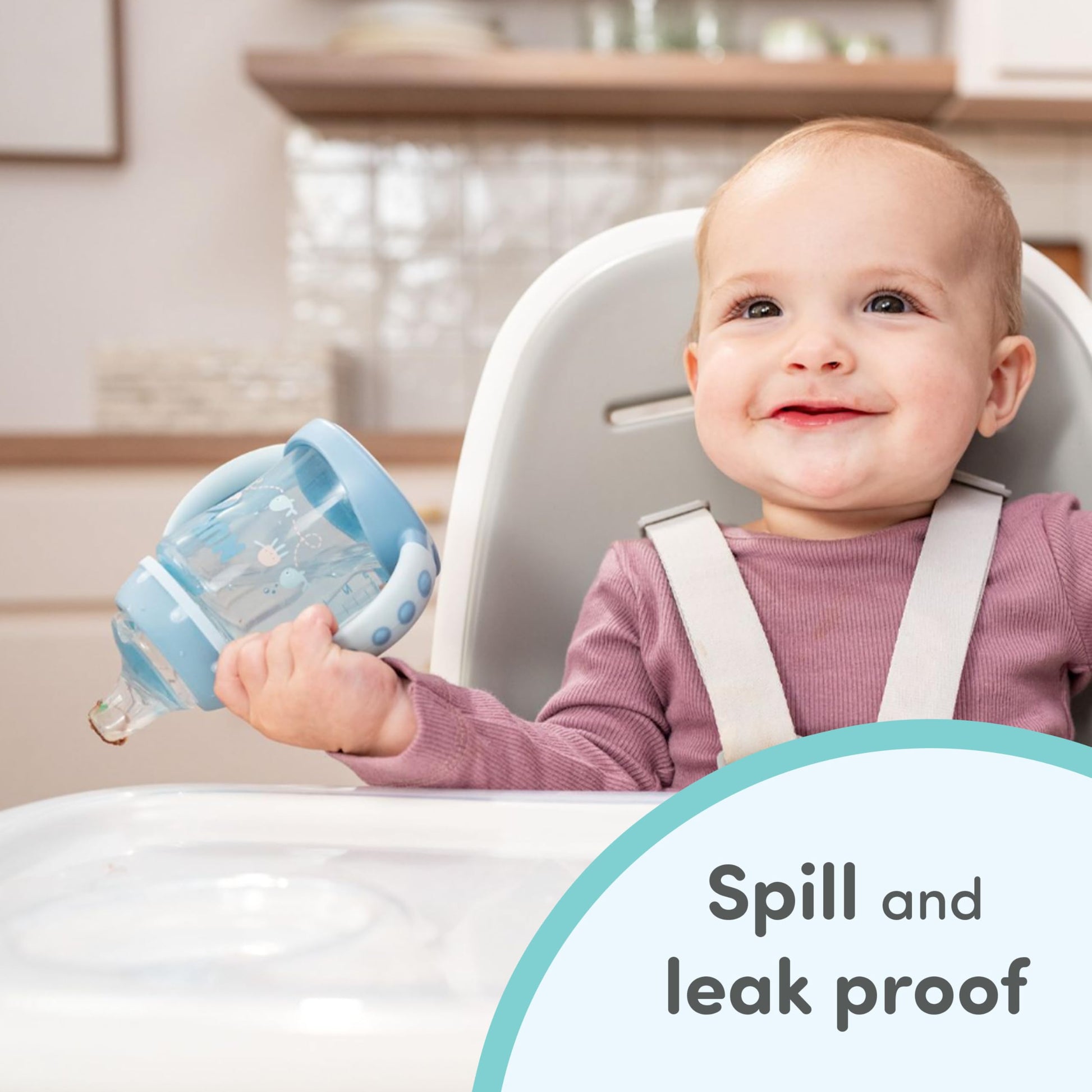 Five pieces of clear NUK replacement spouts arranged on surface