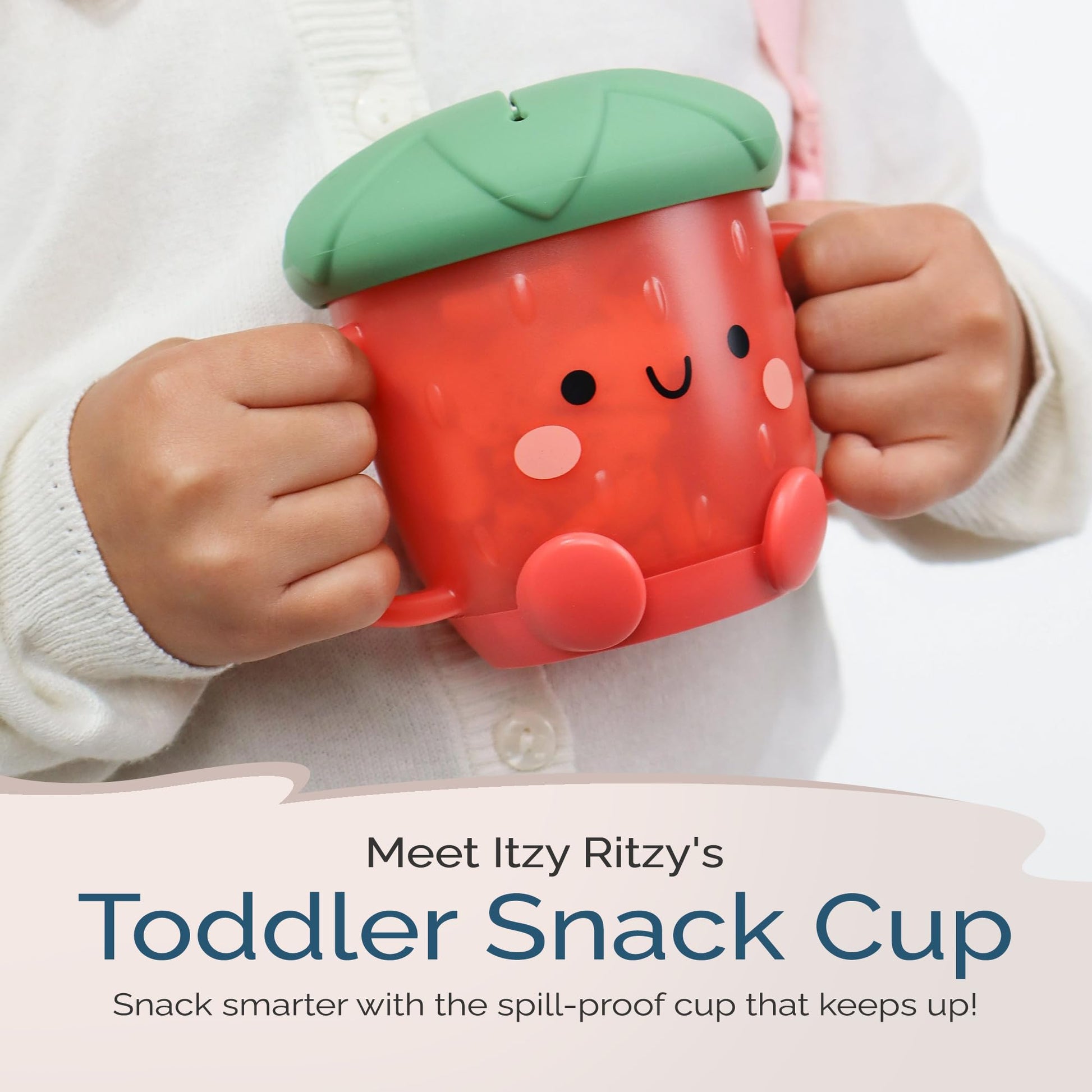 Itzy Ritzy Strawberry Snack Cup showing silicone lid and handles