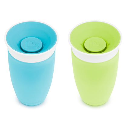 Side profile of the 10 ounce green toddler cup for independent drinking