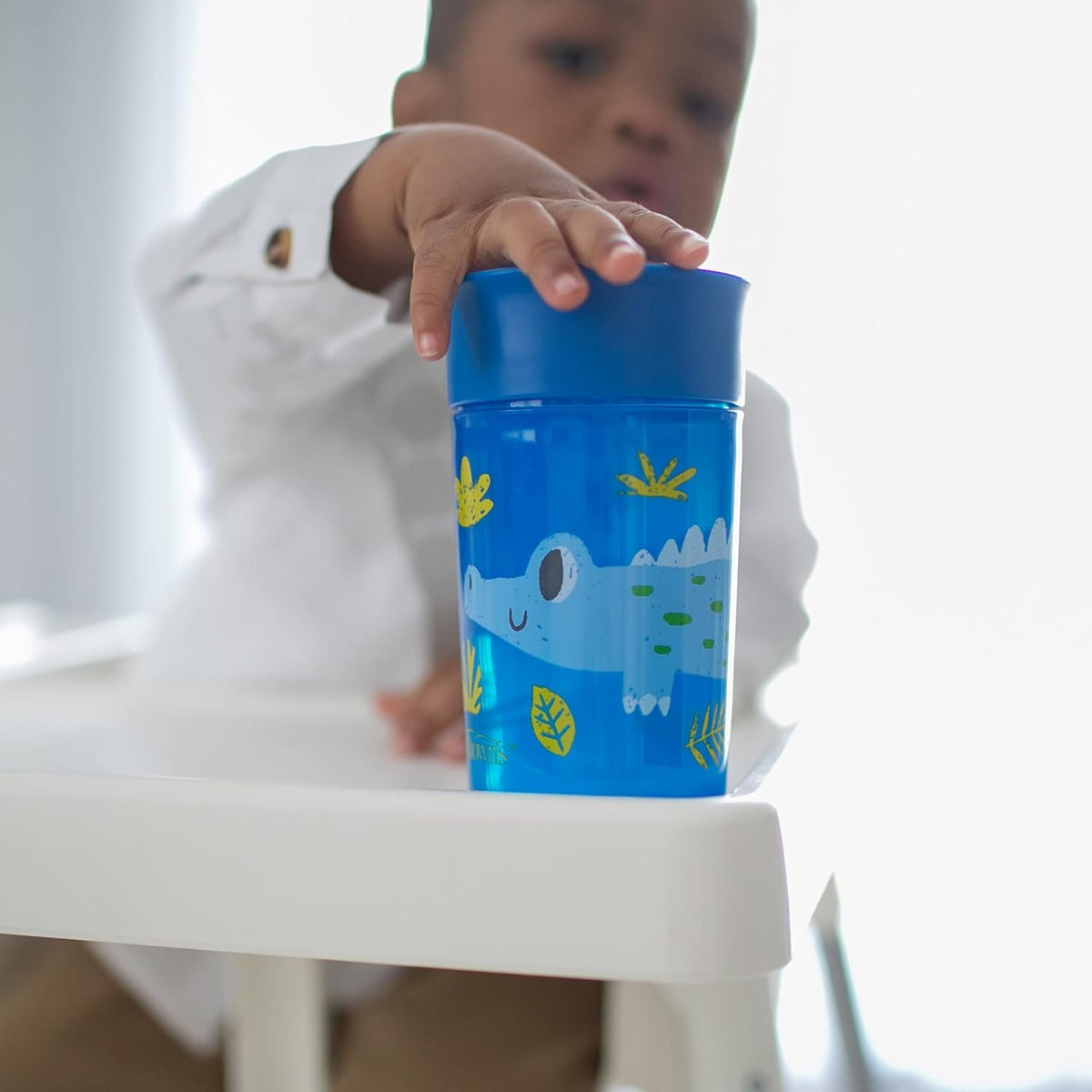Side profile of Dr. Brown's cheers 360 spoutless travel friendly leak free toddler cup