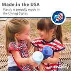 Four true blue Re-Play reusable toddler cups stacked neatly together on a clean kitchen counter.